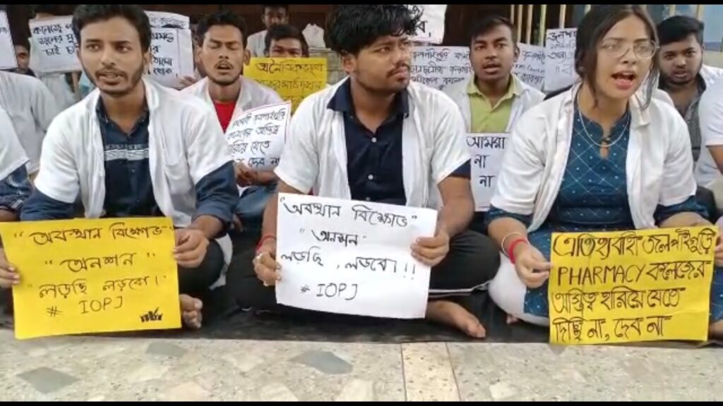 Why was the playground of Pharmacy College taken for the construction of Jalpaiguri Medical College accommodation?