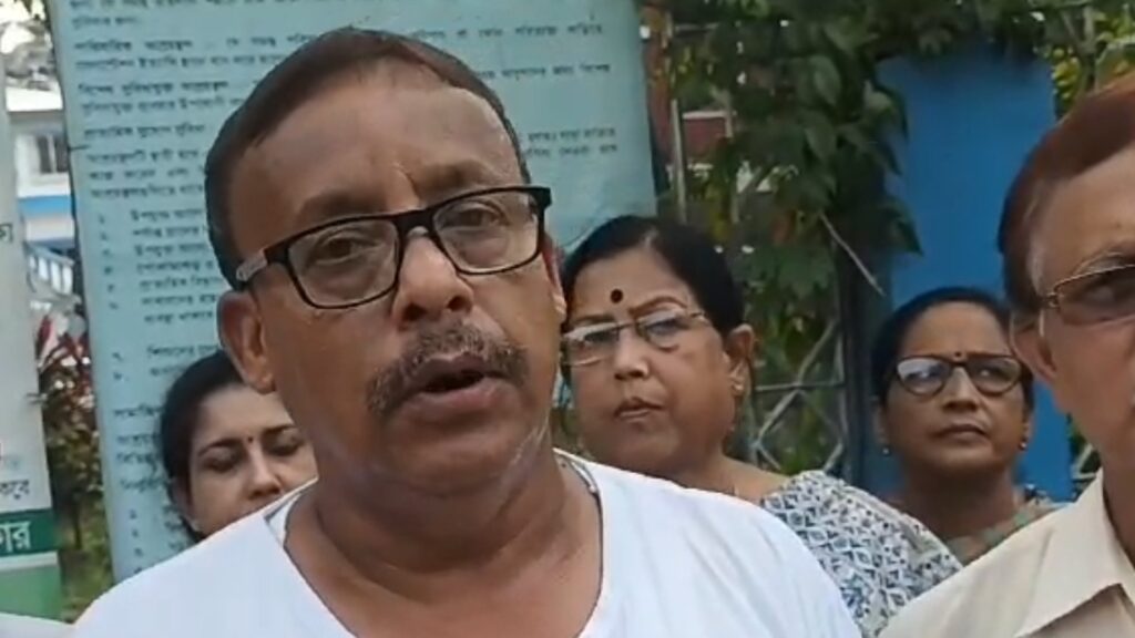 Left front protest in front of Jalpaiguri Municipality demanding reform of poor roads and drainage system.