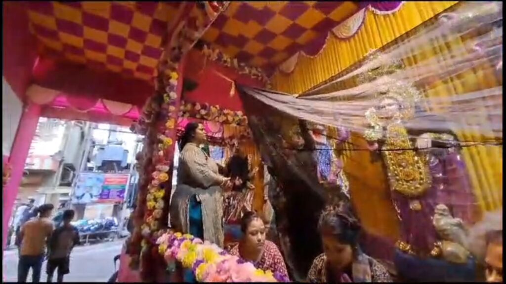 Goddess Durga's face is covered with black cloth before Bodhan
