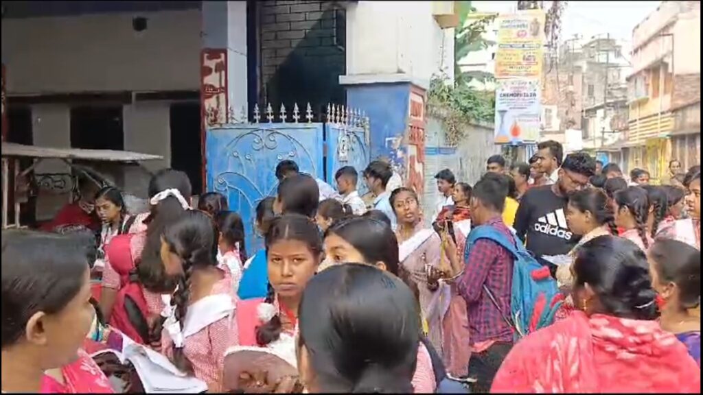 Candidates enter higher secondary examination center through strict checking