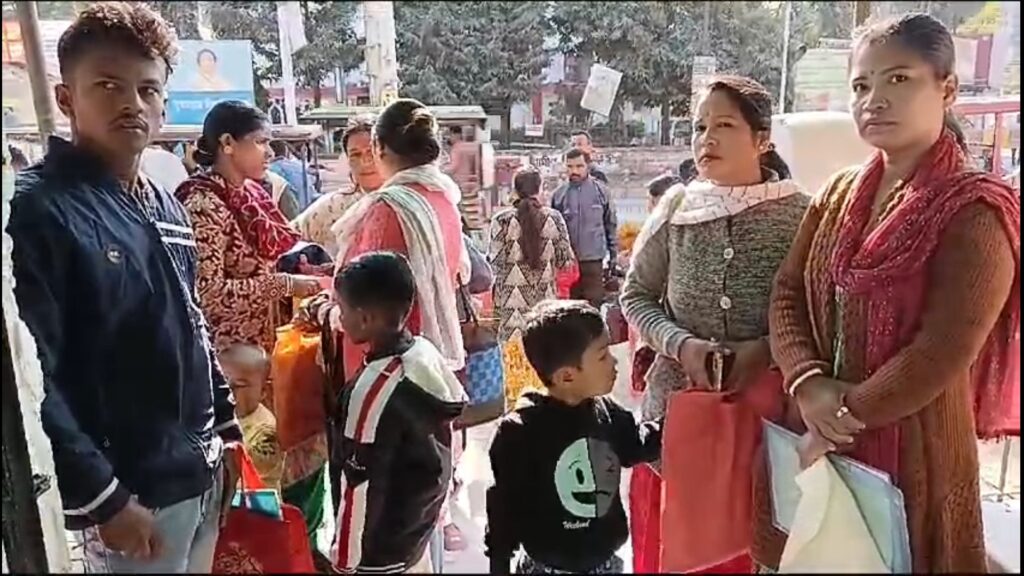 Crowd collecting pre-primary admission forms at Jalpaiguri Fanindradev Primary School