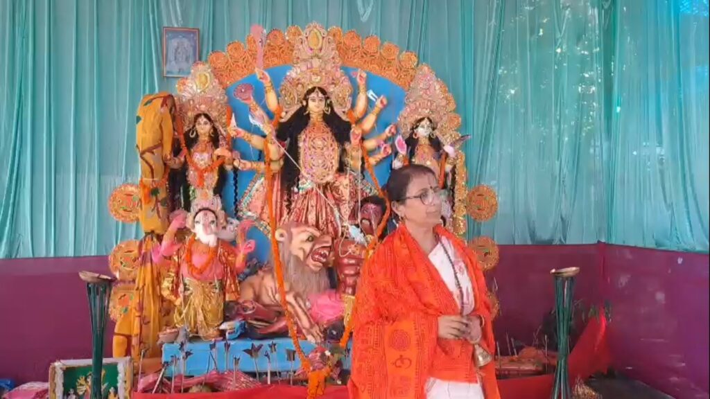 Durga Puja at residence in Jalpaiguri conducted by female priest; visitors flock